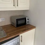Modern Comfortable Four Bedroom House In Great Location